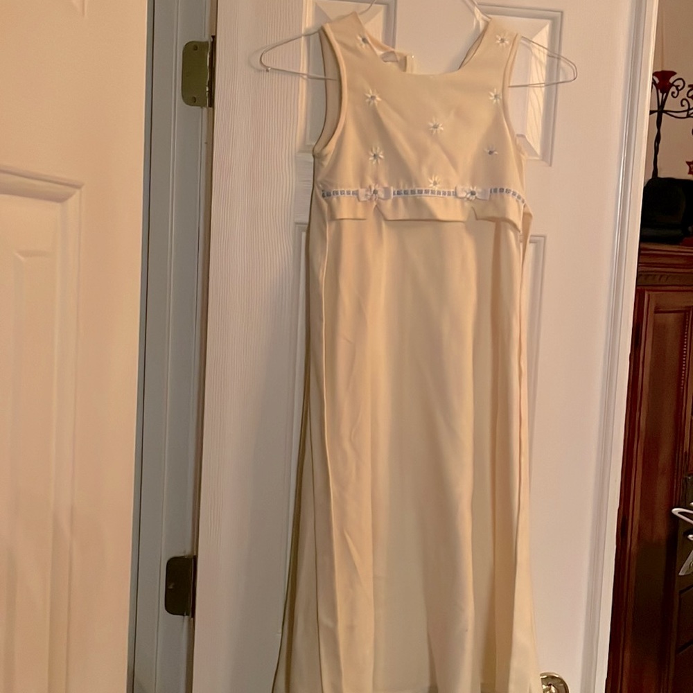 Bonnie Jean, size 7, yellow with pale pink flowers, rayon machine wash cold.